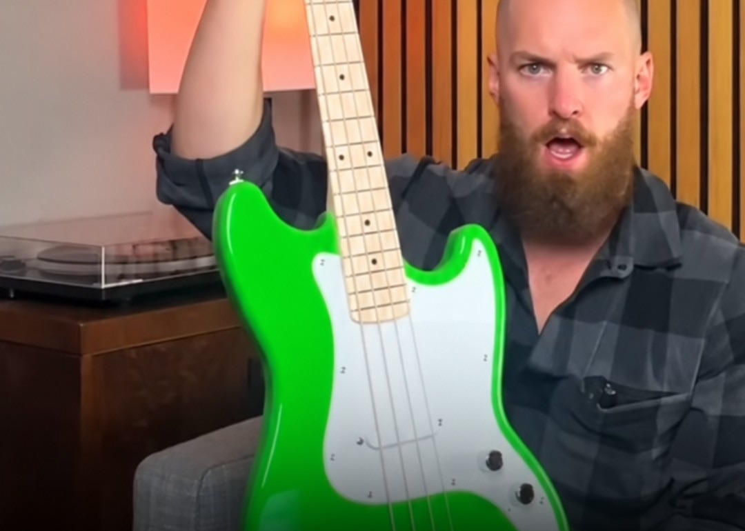Josh Jams with a green Fender bass